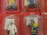 six action figures of a fireman and a firefighter