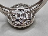sterling silver ring with a skull and crossbone design on the front