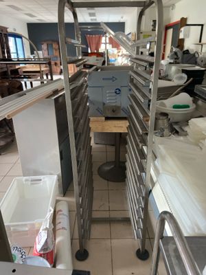 a picture of a commercial kitchen with a lot of counter space