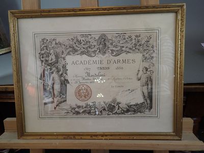 an antique framed picture of a certificate with a picture of a man and a woman