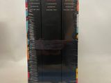a set of three books sitting on top of each other