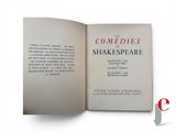 an open book with a picture of a shakespeare play in it