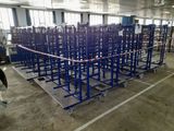 a large room with a lot of chairs and carts in it