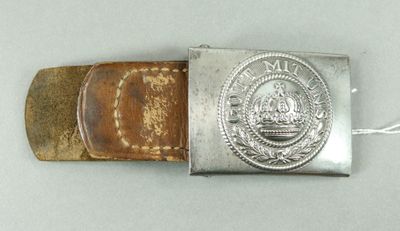 belt buckle with a silver buckle with a picture of a man on it