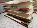 a lot of empty shelves in the store for sale