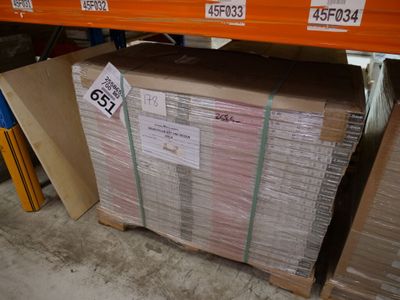 a large stack of boxes sitting on a shelf in a store