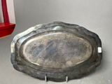 a metal tray that is sitting on a table