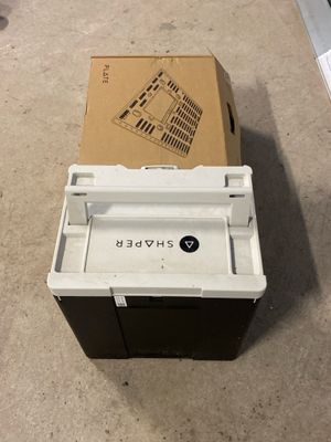 a box that is sitting on the floor next to a box