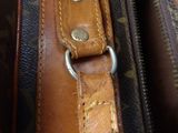 a close up of a brown and black bag