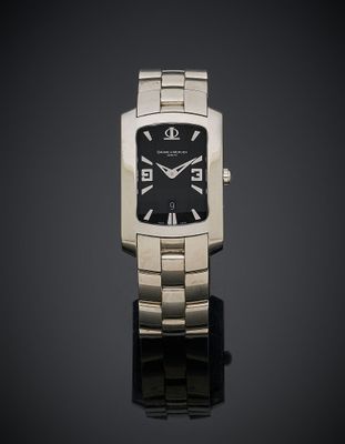 an image of a close up of a wrist watch on a black surface