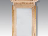 une image représentant un miroir avec un cadre en bois et un miroir posé dessus