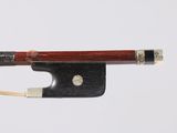 violin bow made of wood and metal on a white background