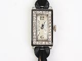 une photo d'une montre-bracelet sertie de diamants