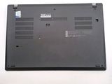 a black laptop that is sitting on a white surface