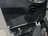 a white truck with the door open and the door open