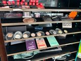 a lot of makeup products on the shelves in the store