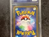a close up of a pokemon card on a table