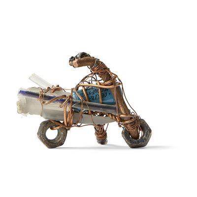 a sculpture of a motorcycle with a man on it