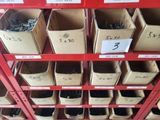 many boxes of assorted items on the shelves