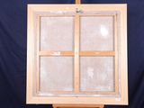a picture of an easel with a window on it