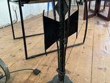 an image of a lamp that is on a wooden floor