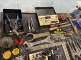 a lot of tools that are sitting on a table