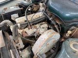 an old car engine that has been rusted and rusted