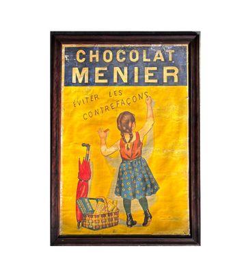 an old chocolate menner sign hangs on a wall