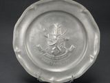 an image of a glass plate with a military emblem on it