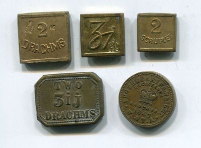 three different types of bronze coins are shown on a white surface