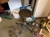 a small table that is sitting on a chair in a room