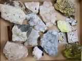 a box full of different kinds of rocks and minerals