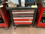 several tools are sitting on top of a table in a garage