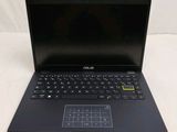 the asus laptop is open and ready to be used
