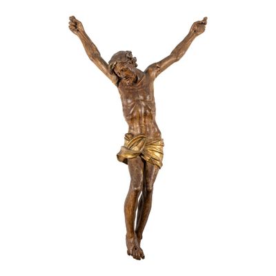 une image représentant une statue de Jésus sur la croix, les bras levés