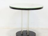 an image of a black and white table with a glass top