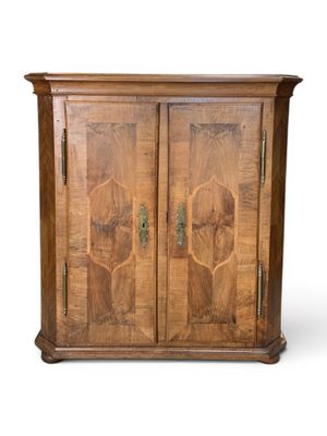 an image of a wooden cabinet with two doors