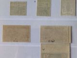 several different types of stamps are displayed on a sheet of paper
