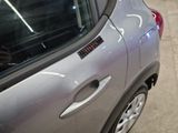 a car that has a sticker on the side of it