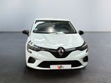 the front view of a white car parked in a showroom