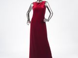 a mannequin wearing a red dress with a long skirt on a mannequin mannequin