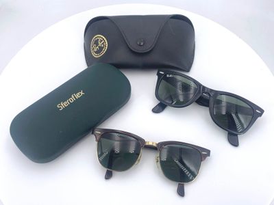 a pair of sunglasses and a case on a table