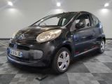 a picture of a small black car on a checkered floor