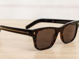 a close up of a pair of sunglasses on a table