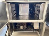 an image of a refrigerator with a fan inside of it