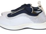 white and blue sneakers on a white background with a white background