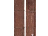 pair of old wooden shutters with peeling paint on them
