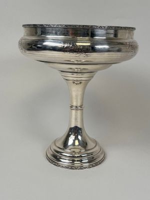 silverplated footed bowl with raised rim and raised feet