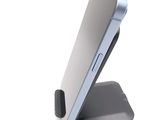 a cell phone that is sitting on top of a stand