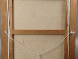 an old wooden easel with a painting hanging on it ' s side